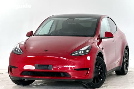 Red 2023 Tesla Model Y Wagon Rear-Wheel Drive