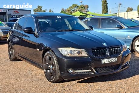 Black 2011 BMW 320D Sedan Lifestyle