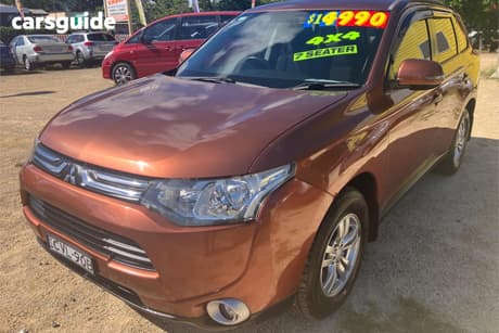 Orange 2012 Mitsubishi Outlander Wagon Ls (4X4)