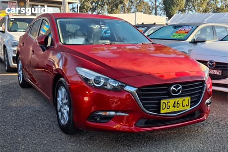 Red 2016 Mazda 3 Hatchback Touring