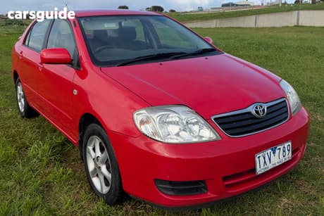 Red 2006 Toyota Corolla Sedan Ascent Sport