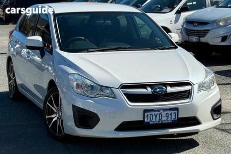 White 2012 Subaru Impreza Hatchback 2.0I (Awd)