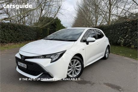 White 2024 Toyota Corolla Hatchback Ascent Sport Hybrid