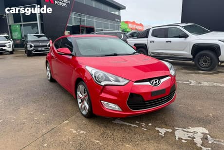 Red 2014 Hyundai Veloster Coupe +