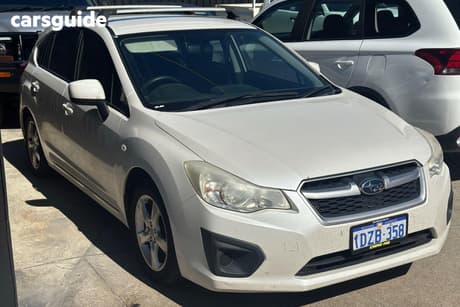 White 2012 Subaru Impreza Hatchback 2.0I (Awd)