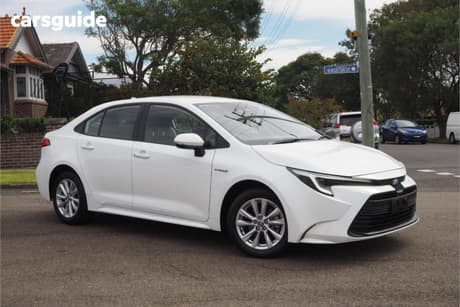 White 2024 Toyota Corolla Sedan Ascent Sport Hybrid
