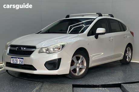 White 2012 Subaru Impreza Hatchback 2.0I (Awd)