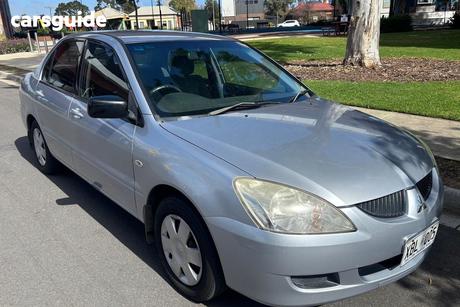 Silver 2004 Mitsubishi Lancer Sedan Es