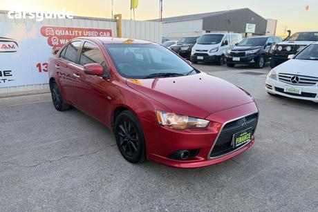 Red 2015 Mitsubishi Lancer Sedan Ls