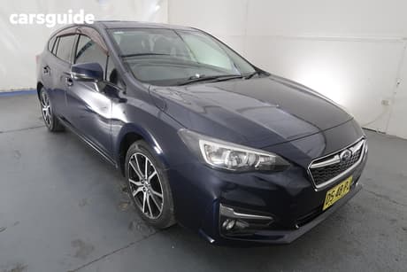 White 2016 Subaru Impreza Hatchback 2.0P Premium (Awd)