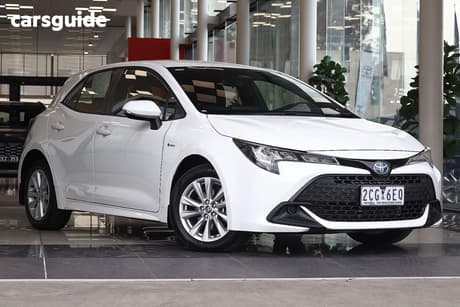 White 2025 Toyota Corolla Hatchback Ascent Sport Hybrid
