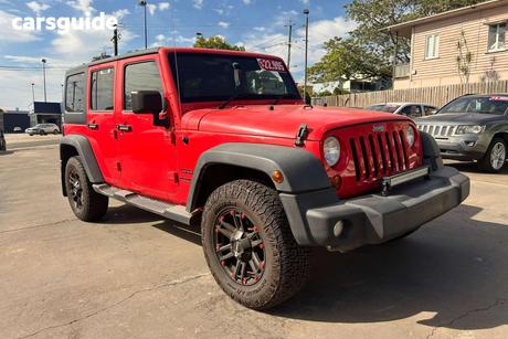 Red 2013 Jeep Wrangler Softtop Unlimited Sport (4X4)