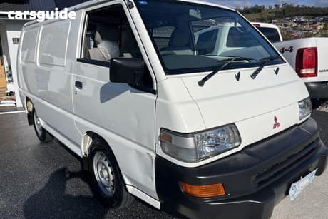 White 2010 Mitsubishi Express Commercial