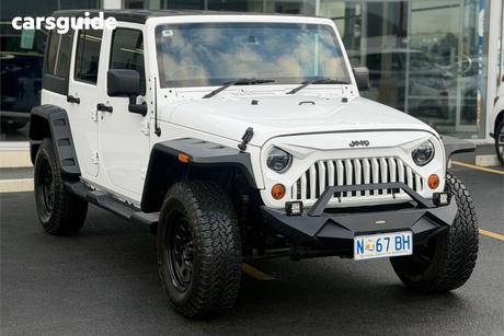 White 2013 Jeep Wrangler Softtop Unlimited Sport (4X4)