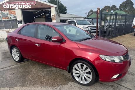 Red 2009 Kia Cerato Sedan Sli