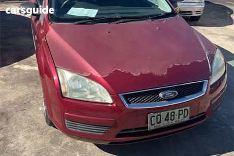 Red 2007 Ford Focus Sedan Cl