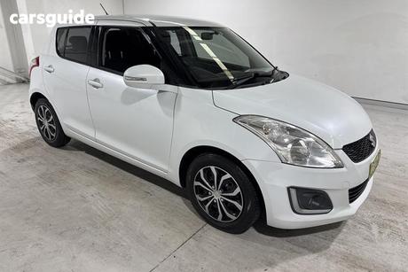White 2013 Suzuki Swift Hatchback Gl Navigator