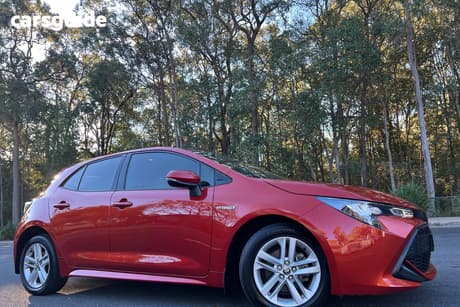 Orange 2019 Toyota Corolla Hatchback Ascent Sport (Hybrid)