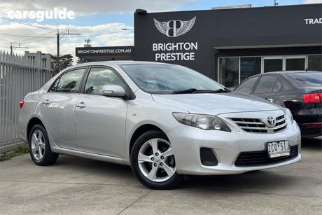 Silver 2011 Toyota Corolla Sedan Conquest