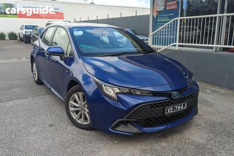 Blue 2024 Toyota Corolla Hatchback Ascent Sport + Conv Pk Hybrid