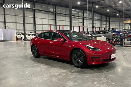 Red 2020 Tesla Model 3 Sedan Standard Range Rwd