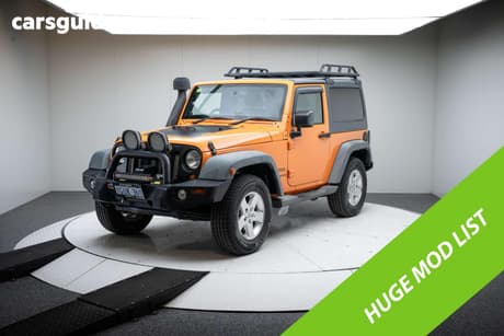 Orange 2013 Jeep Wrangler Softtop Sport (4X4)