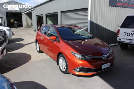 Orange 2015 Toyota Corolla Hatchback Ascent Sport