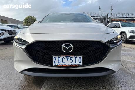 Beige 2024 Mazda 3 Hatchback G20 Pure