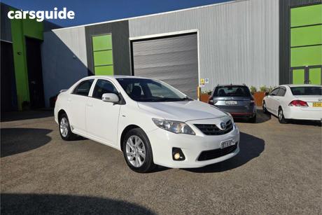 White 2012 Toyota Corolla Sedan Ascent Sport