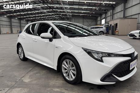 White 2024 Toyota Corolla Hatchback Ascent Sport + Conv Pk Hybrid