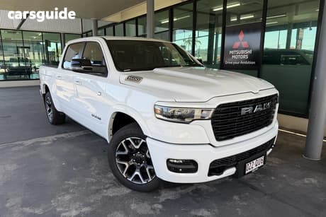 White 2025 RAM 1500 Crew Cab Utility Rebel Hurricane