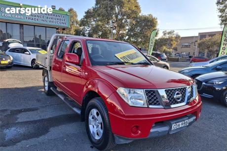 Red 2011 Nissan Navara Dual Cab Pick-up St (4X4)