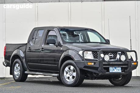 Black 2010 Nissan Navara Dual Cab Pick-up Rx (4X2)