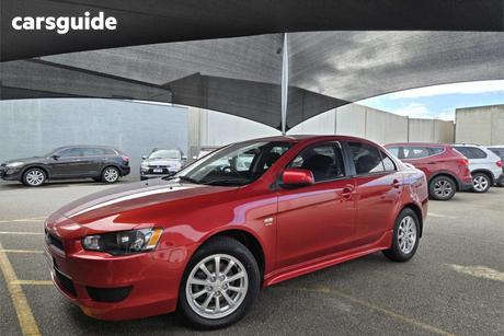Red 2010 Mitsubishi Lancer Sedan Es
