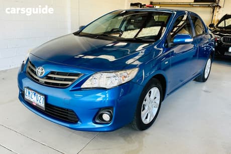 Blue 2012 Toyota Corolla Sedan Ascent