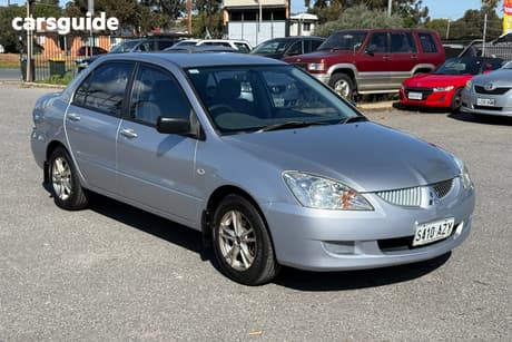 Silver 2004 Mitsubishi Lancer Sedan Es