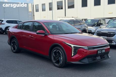 Red 2025 Kia K4 Sedan Sport+