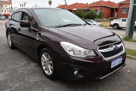 Burgundy 2012 Subaru Impreza Sedan 2.0I-L (Awd)