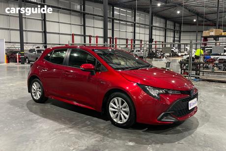Red 2024 Toyota Corolla Hatchback Ascent Sport Hybrid