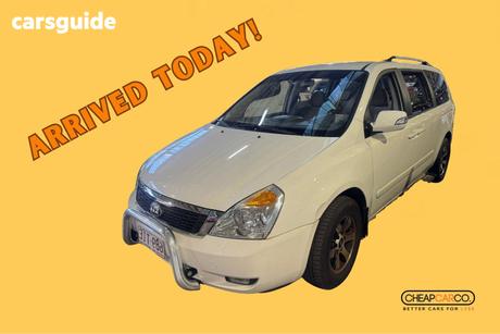 White 2012 Kia Grand Carnival Wagon Platinum