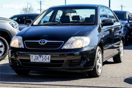 Black 2005 Toyota Corolla Sedan Conquest