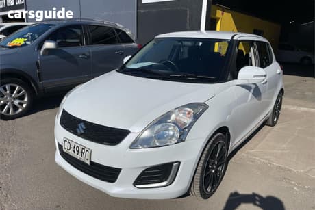 White 2015 Suzuki Swift Hatchback Gl