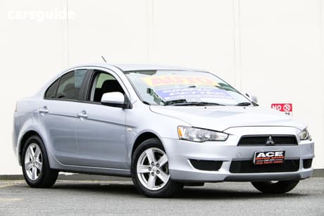 Silver 2013 Mitsubishi Lancer Sedan Es