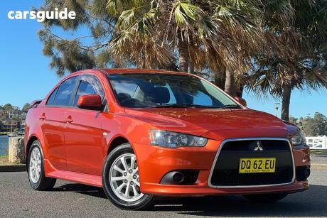 Orange 2012 Mitsubishi Lancer Sedan Es