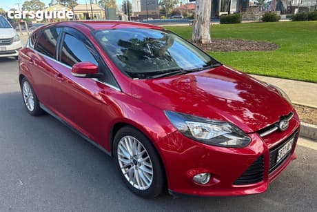 Red 2012 Ford Focus Hatchback Sport