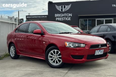 Red 2010 Mitsubishi Lancer Sedan Es