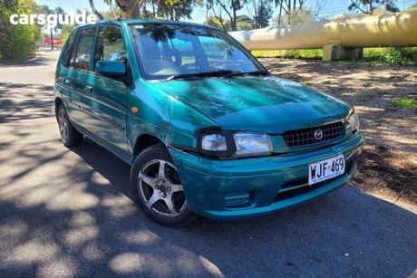 Green 1999 Mazda 121 Hatchback Metro