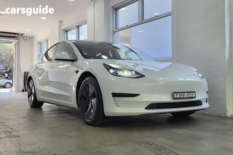 White 2021 Tesla Model 3 Sedan Standard Range Plus Rwd