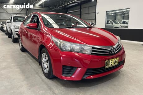 Red 2014 Toyota Corolla Sedan Ascent