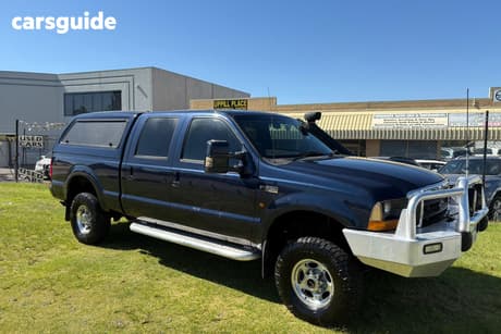 Blue 2003 Ford F250 Crew Cab Pickup Xlt (4X4)